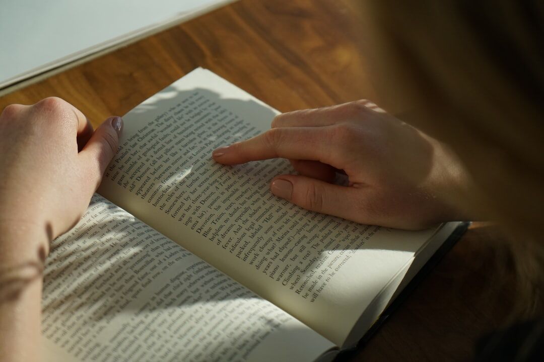 person reading book quietly
