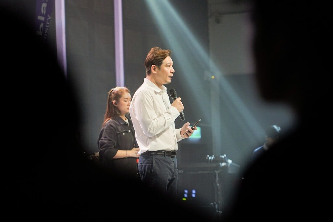 person speaking confidently on stage
